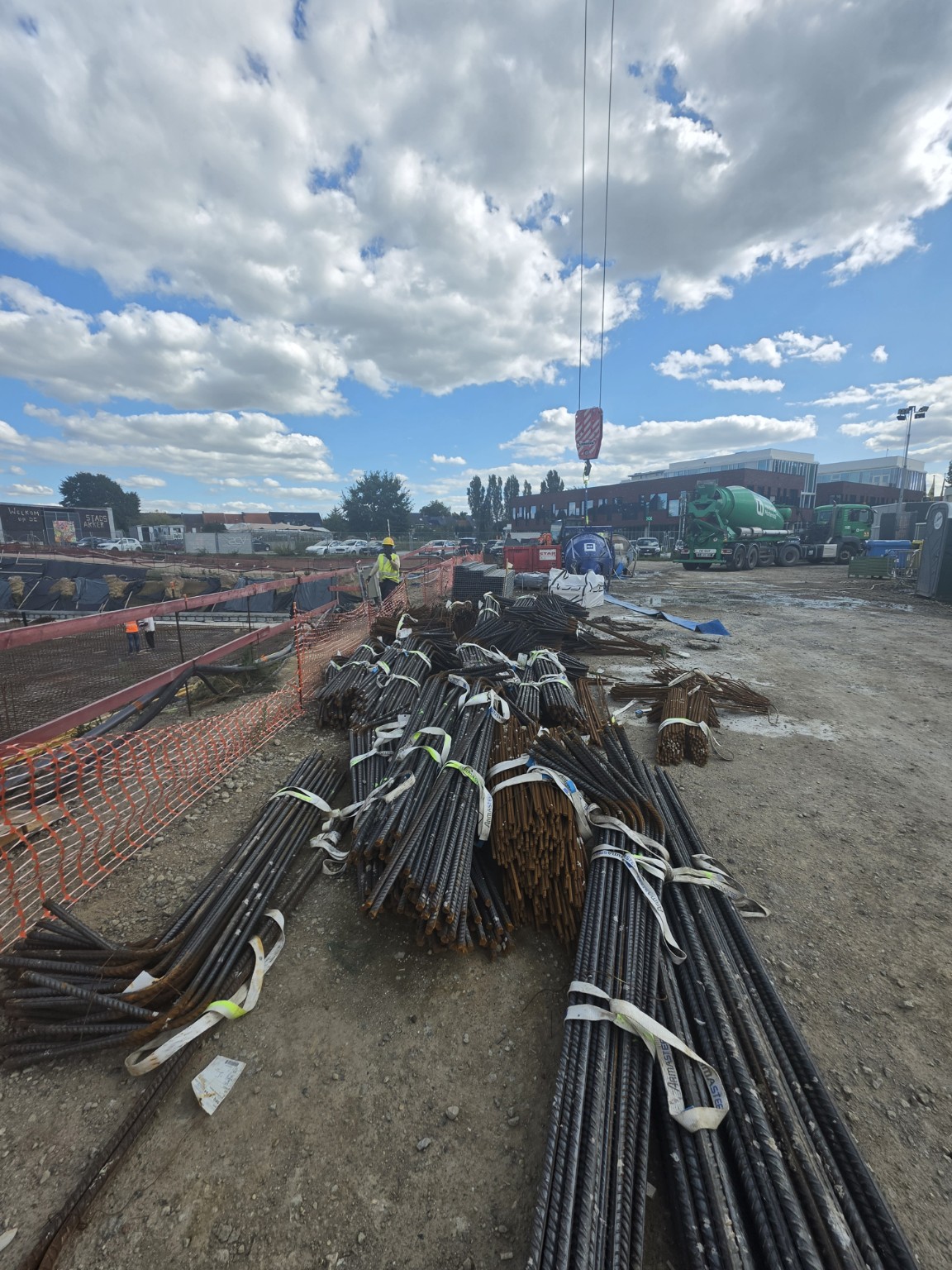 Shaped reinforcement bars stored ready for installation.
