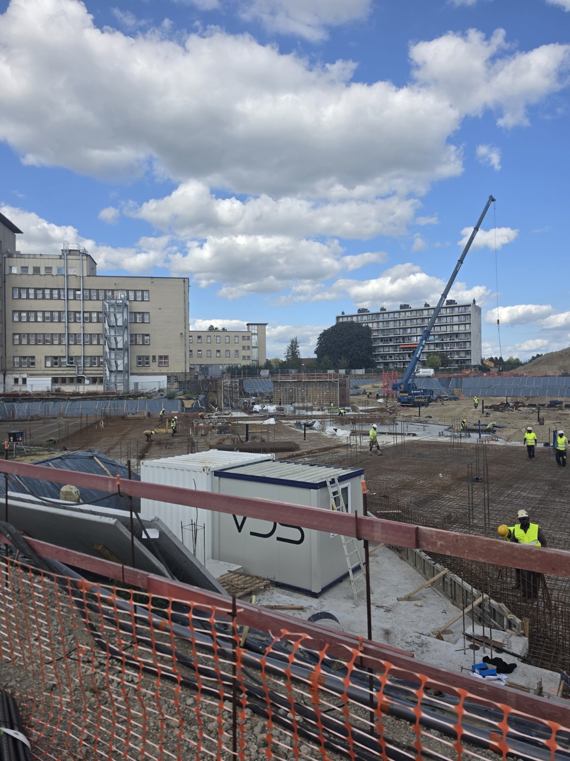 Site view featured in the film — work areas around the tower cranes.